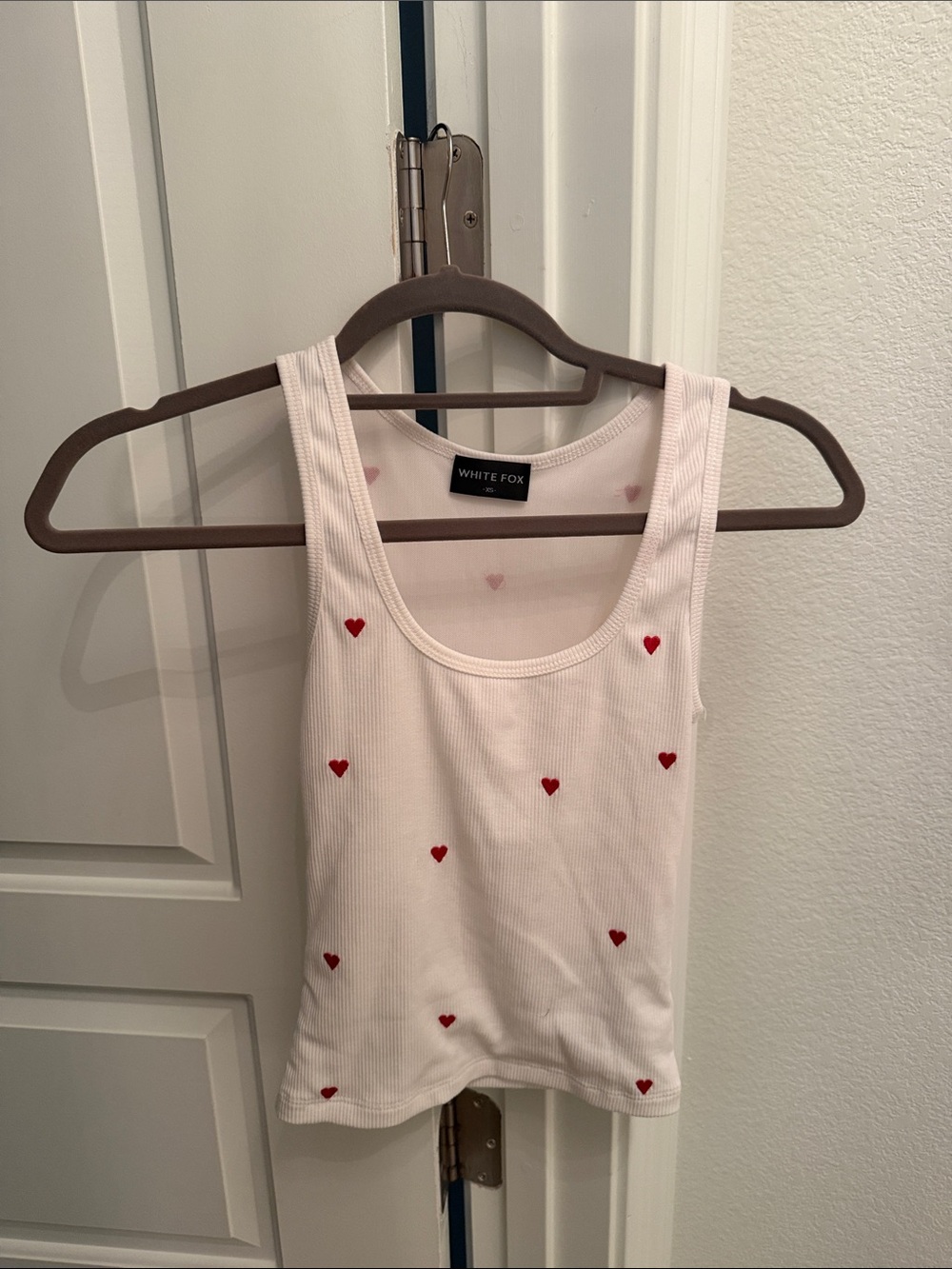 White Fox Boutique White Ribbed Tank with Red Heart Accents